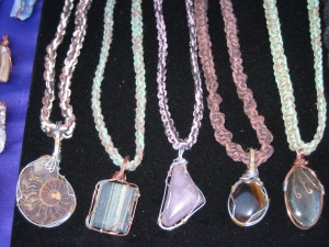 Pendants of wire wrapped stones by James Smith. Hemp work by me.
