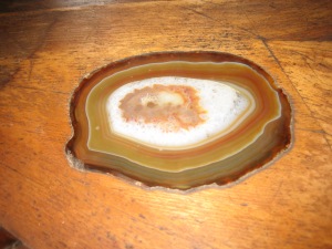 This photo (taken by me) is of an agate slice set in the counter top of the bar.